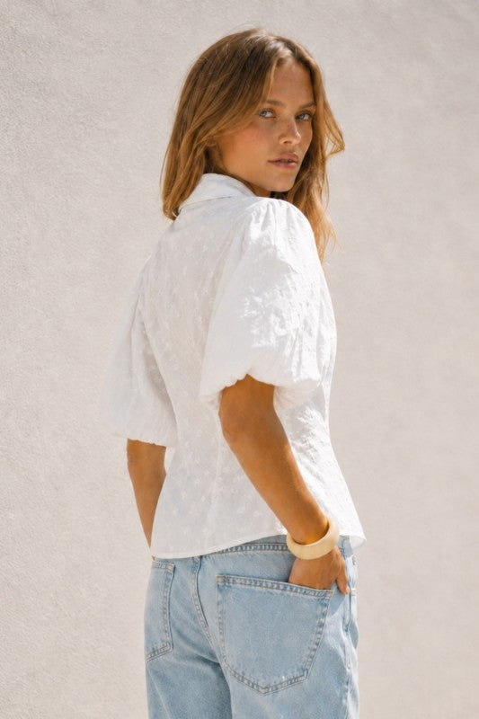 white embroidered shirt